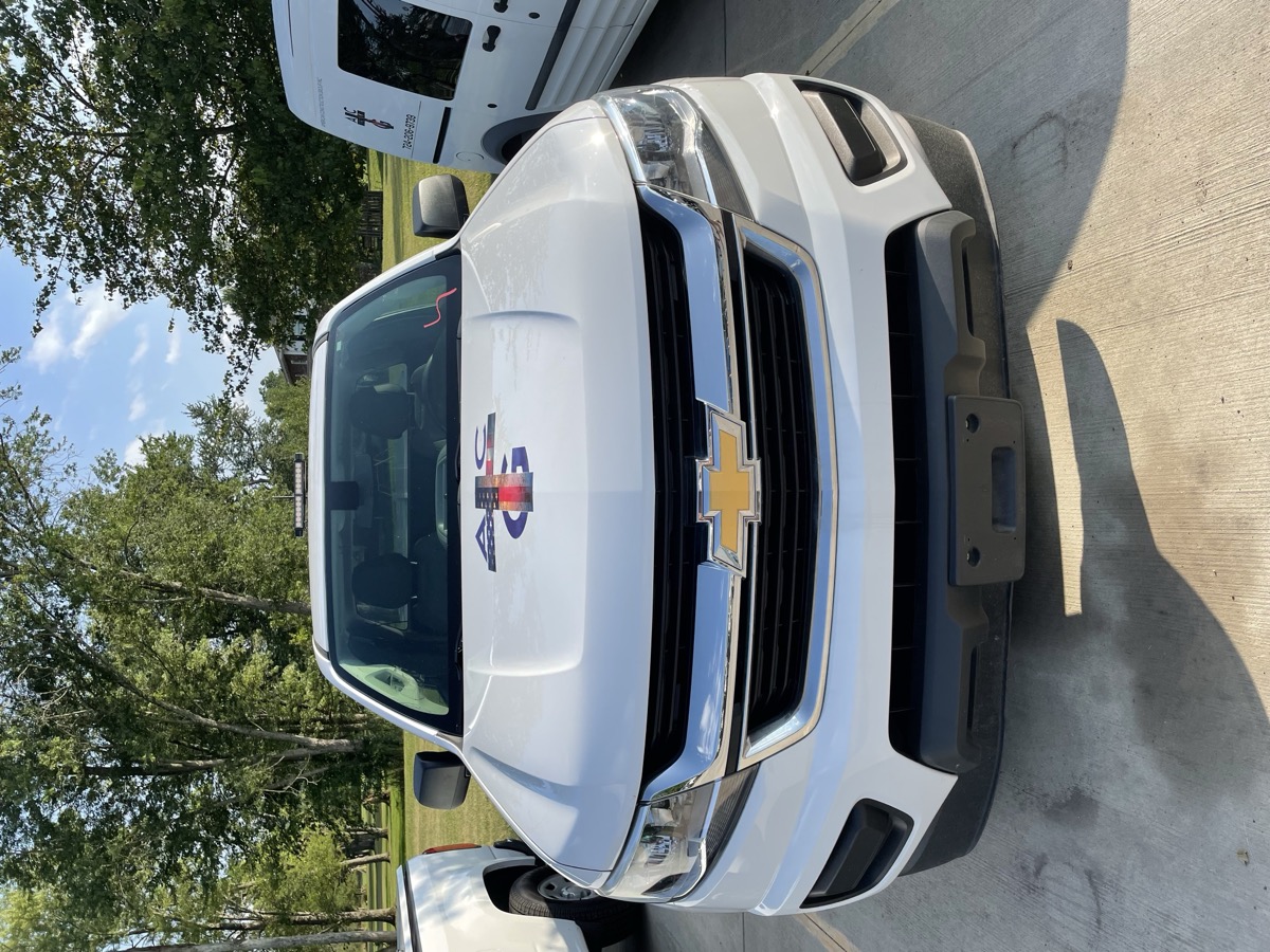 American Construction Group truck with the company’s existing emblem